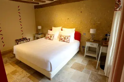 Un ou plusieurs lits dans un hébergement de l'établissement Chambre Chinon