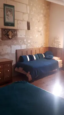 Un ou plusieurs lits dans un hébergement de l'établissement LOGÉVEIL - Maison d'hôtes ''Charme et Bien-être'' - proche forêt et golf