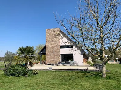Jardin de l'établissement Maison avec piscine