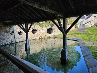 Jardin de l'établissement Au pied du Lavoir Chambre Odile