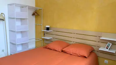 Un ou plusieurs lits dans un hébergement de l'établissement Appartement 4 chambres Idéal 24h moto & voiture