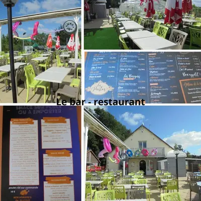 Restaurant ou autre lieu de restauration dans l'établissement Mobil-home équipé pour un séjour au vert avec piscine