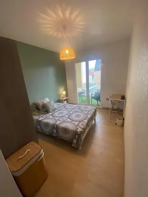 Un ou plusieurs lits dans un hébergement de l'établissement Hyper Centre Apartment with Garage