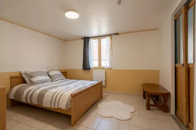 Un ou plusieurs lits dans un hébergement de l'établissement Maison Zen - 20 min du centre du Mans