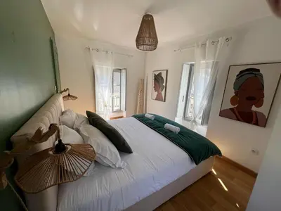 Un ou plusieurs lits dans un hébergement de l'établissement Appartement T2 Lumineux centre ville d'Amboise avec vue sur le Château Royal
