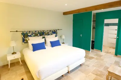 Un ou plusieurs lits dans un hébergement de l'établissement Chambre Saumur