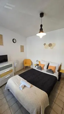 Un ou plusieurs lits dans un hébergement de l'établissement Charme de Loire
