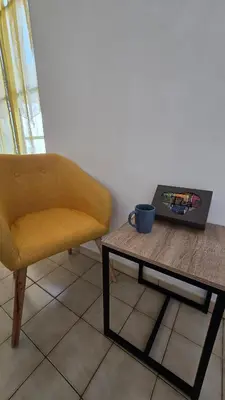 Coin salon dans l'établissement Charme de Loire