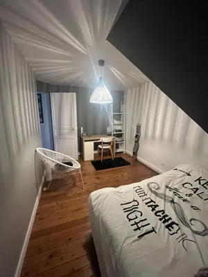 Un ou plusieurs lits dans un hébergement de l'établissement Maison 5mn du centre ville du Mans à pied