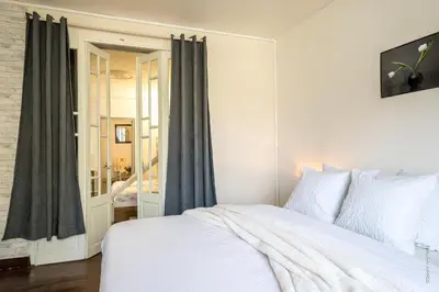 Un ou plusieurs lits dans un hébergement de l'établissement Havre de Ville avec Cour Parking & Wifi GRATUIT