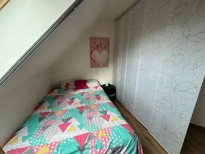 Un ou plusieurs lits dans un hébergement de l'établissement Maison proche du circuit des 24h du Mans