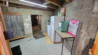 Cuisine ou kitchenette dans l'établissement Gîte Aux-Enverons
