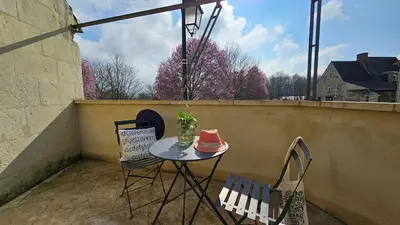 Balcon ou terrasse dans l'établissement Gîte Aux-Enverons