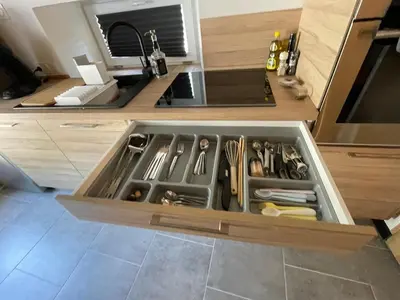 Cuisine ou kitchenette dans l'établissement Gite le magnolia