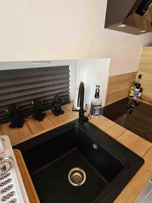Cuisine ou kitchenette dans l'établissement Gite le magnolia