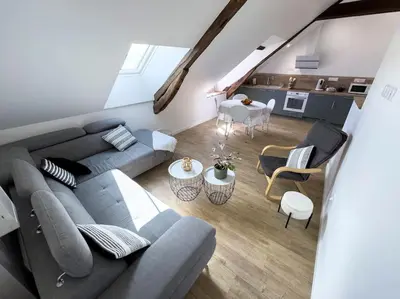 Coin salon dans l'établissement Le Logis de Trèfle