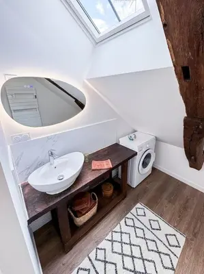Salle de bains dans l'établissement Le Logis de Trèfle