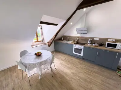 Cuisine ou kitchenette dans l'établissement Le Logis de Trèfle