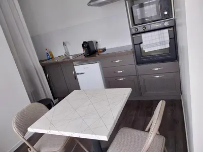 Cuisine ou kitchenette dans l'établissement L olivier