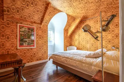 Un ou plusieurs lits dans un hébergement de l'établissement Maison 15 p avec piscine sud Touraine