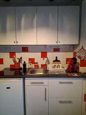 Cuisine ou kitchenette dans l'établissement Au Cœur de Lignières