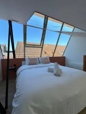 Un ou plusieurs lits dans un hébergement de l'établissement Loft avec Jaccuzi