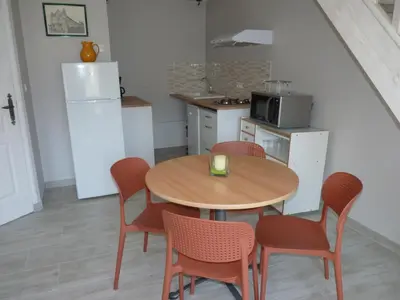 Cuisine ou kitchenette dans l'établissement Gite de l'ilot