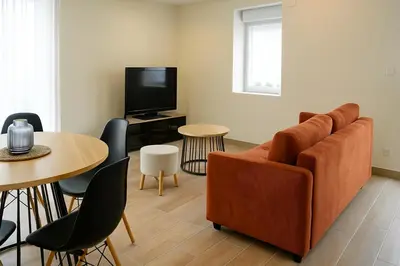 Télévision ou salle de divertissement dans l'établissement Maison des Hirondelles