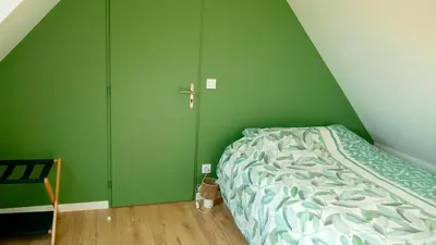 Un ou plusieurs lits dans un hébergement de l'établissement Maison des Hirondelles