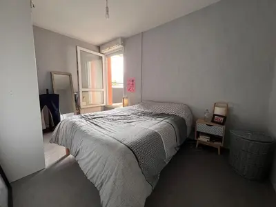 Un ou plusieurs lits dans un hébergement de l'établissement Appartement entier avec 2 terrasses