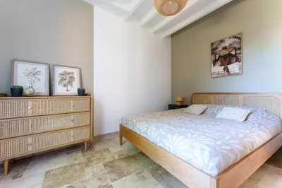 Un ou plusieurs lits dans un hébergement de l'établissement Maison 3 chambre Amboise Centre