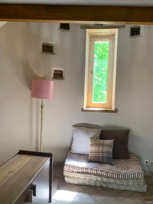 Un ou plusieurs lits dans un hébergement de l'établissement Le Colombier et son parc