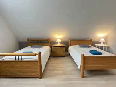 Un ou plusieurs lits dans un hébergement de l'établissement Villa Isaac - Piscine naturelle - Proche Boulerie Jump - 8p