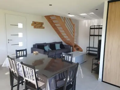 Coin salon dans l'établissement Logement indépendant proche circuit 24h Le Mans