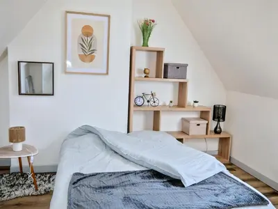 Un ou plusieurs lits dans un hébergement de l'établissement Tranquillité, Parking, Proche Châteaux de la Loire