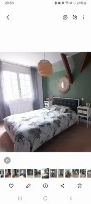 Un ou plusieurs lits dans un hébergement de l'établissement Belle maison proche du futuroscope