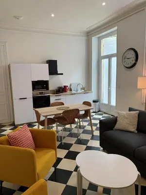 Cuisine ou kitchenette dans l'établissement Appartement #2 cœur de ville