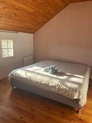 Un ou plusieurs lits dans un hébergement de l'établissement Maison de campagne Luzé