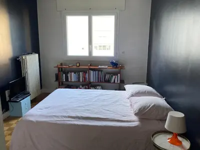 Un ou plusieurs lits dans un hébergement de l'établissement Appartement de Laura