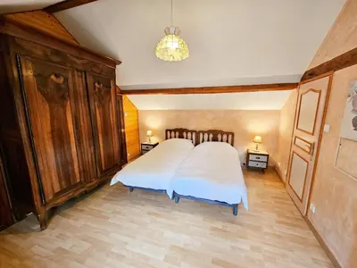 Un ou plusieurs lits dans un hébergement de l'établissement Gîte Tourangelle avec Piscine Intérieure, Wifi, Jardin - FR-1-381-619