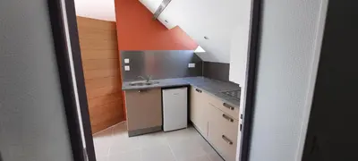 Cuisine ou kitchenette dans l'établissement Le Mermoz