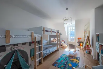 Un ou plusieurs lits dans un hébergement de l'établissement L'HIRONDELLE