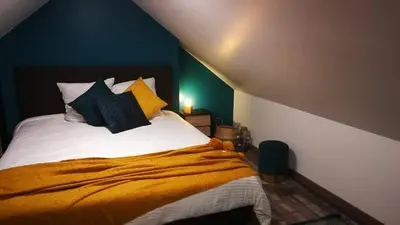 Un ou plusieurs lits dans un hébergement de l'établissement Maison Acacias Le Mans