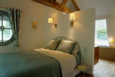 Un ou plusieurs lits dans un hébergement de l'établissement Eco-gîte - Domaine de La Gavolerie