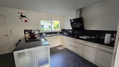 Cuisine ou kitchenette dans l'établissement Villa Bastilaure