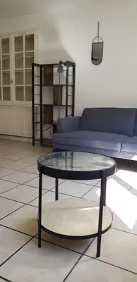 Coin salon dans l'établissement Grand appartement à Thouars