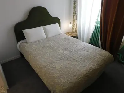Un ou plusieurs lits dans un hébergement de l'établissement Palais abbatial de Bourgueil