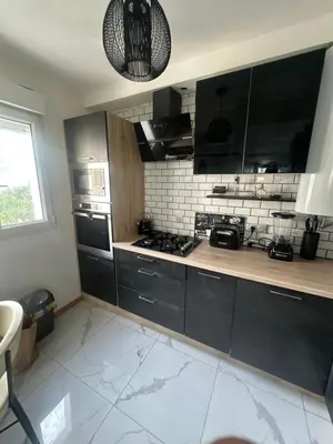 Cuisine ou kitchenette dans l'établissement Centre ville