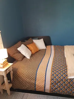 Un ou plusieurs lits dans un hébergement de l'établissement Chambre double chez l'habitant proche du circuit