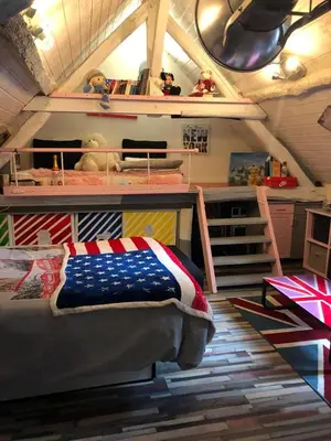 Un ou plusieurs lits dans un hébergement de l'établissement Maison atypique 3 chambres